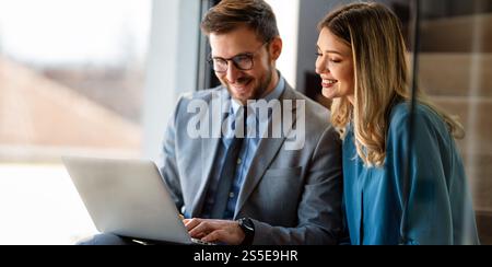 Professional business executive managers office team working using laptop computer in office Stock Photo