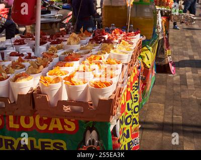 A street vendor selling bags of highly spiced potato chips. Mexico City, Mexico Stock Photo