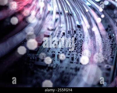Fibre optics carrying data at speed to a computer Stock Photo
