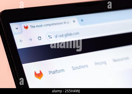 New York, USA - January 10, 2025: GitLab DevOps platform and software solutions website homepage displayed with logo on laptop screen Stock Photo