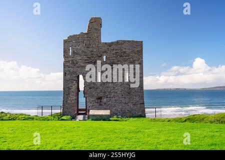 Ruins of Ballybunion castle standing on ocean shore in County Kerry, Ireland. One of the attractions of Wild Atlantic Way. Stock Photo