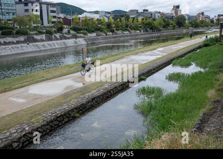 Riverside Walkway along the Kamo River in Central Kyoto Japan Stock Photo