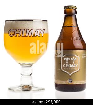 Bottle and glass of Belgian Chimay Gold Blond beer isolated on white background Stock Photo