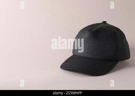 Stylish black baseball cap on light grey background. Mockup for design Stock Photo
