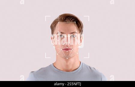 Facial recognition technology demonstrating identification of a person's face Stock Photo