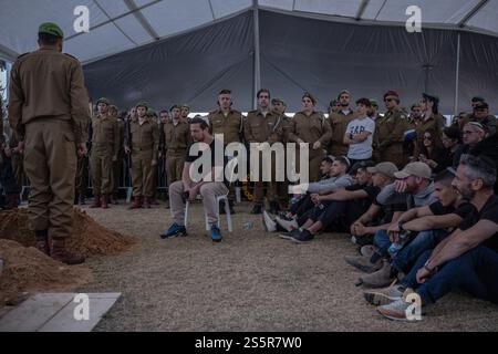 21 January 2025, Israel, Tel Aviv: The body of a dead person is covered ...