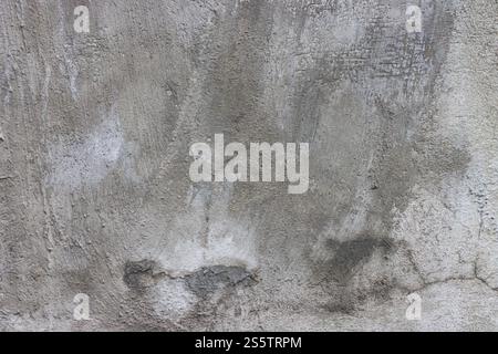 abstract background of an old shabby painted grey concrete wall Stock Photo