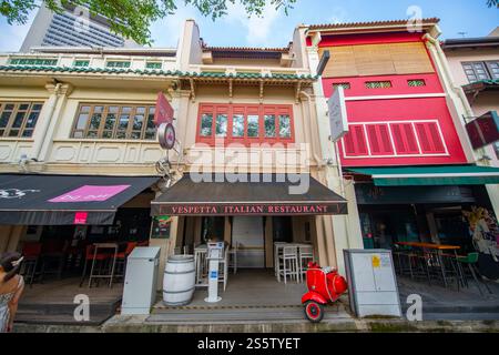 Historic restaurants and bars on Boat Quay at the Singapore River in downtown core of Central Area, Singapore. Stock Photo