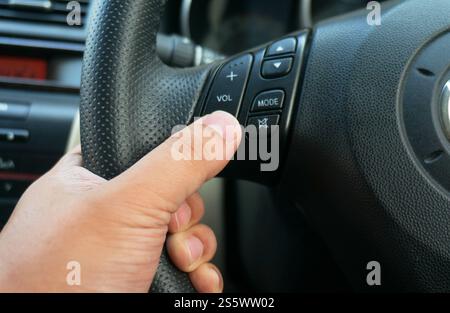 man driver hand use the turning signal switch safety driving concept Stock Photo