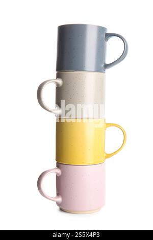 Stack of different ceramic mugs isolated on white background Stock Photo
