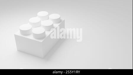 A white Lego block is shown on a white background. The block is the only object in the image, and it is the main focus of the scene. Concept of a new Stock Photo
