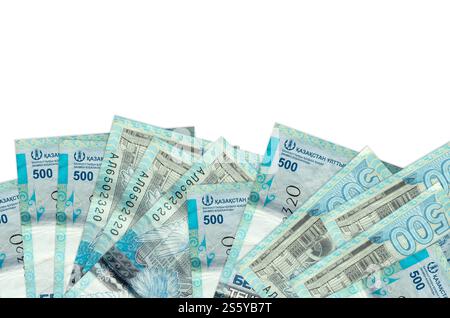 500 Kazakhstani tenge bills lies on bottom side of screen isolated on white background with copy space. Background banner template for business Stock Photo