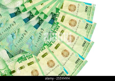 2000 Kazakhstani tenge bills lies isolated on white background with copy space stacked in fan shape close up. Financial transactions concept. 2000 Stock Photo