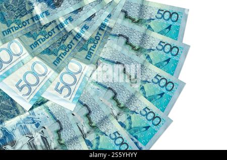 500 Kazakhstani tenge bills lies isolated on white background with copy space stacked in fan shape close up. Financial transactions concept. 500 Stock Photo