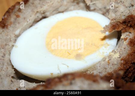 Close up of a Cut Scotch Hen Egg With Whites and Yolk Boiled Stock Photo