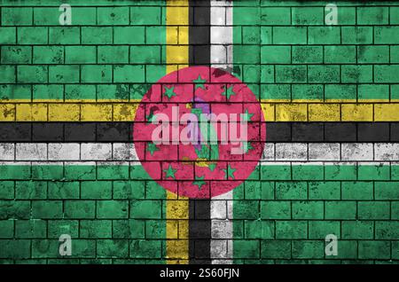 Dominica flag is painted onto an old brick wall Stock Photo - Alamy