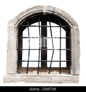 A rustic arched window with iron bars surrounded by a stone frame isolated on white Stock Photo