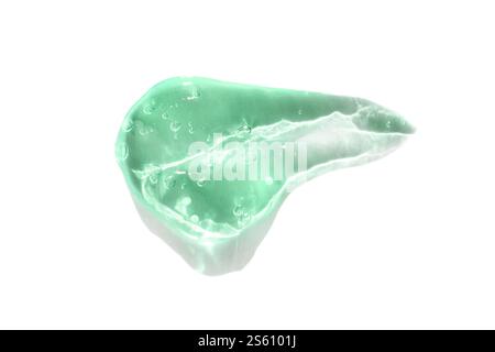 Green crystal soap with bubbles on white background. Stock Photo