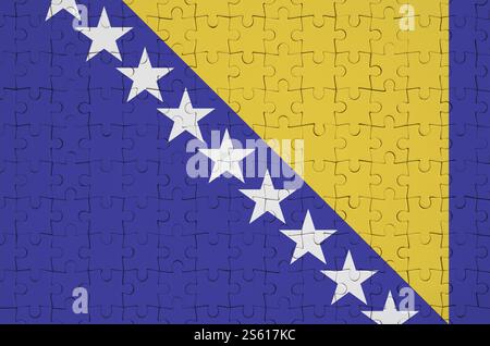 Bosnia and Herzegovina flag is depicted on a folded puzzle Stock Photo