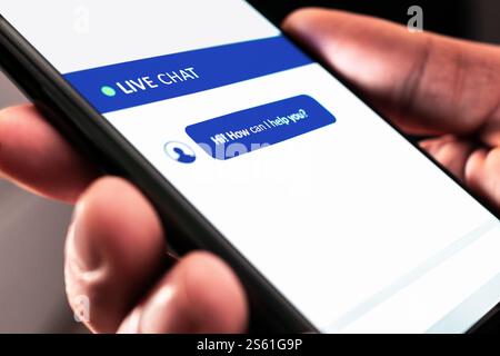 Live customer chat or chatbot service. Support bot for online help on website. Automated message in mobile phone. Assistant and communication app. Stock Photo