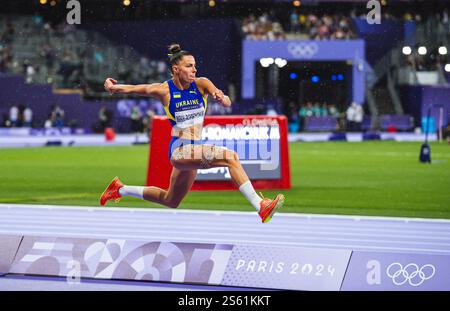 Maryna BEKH-ROMANCHUK participating in the Triple Jump at the Paris 2024 Olympic Games. Stock Photo