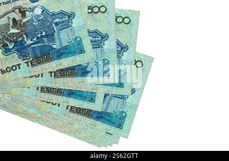 500 Kazakhstani tenge bills lies in small bunch or pack isolated on white. Mockup with copy space. Business and currency exchange concept. 500 Stock Photo