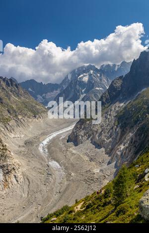Alps scenic landscape on Tour du Montblanc. Rocky and snow summit peaks of the Alps on the trekking route TMB around Mont Blanc in Courmayeur Stock Photo