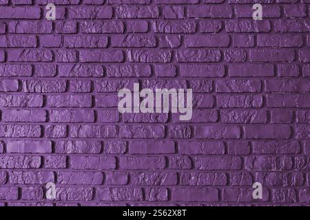 Purple colored old brick wall texture, architecture brickwork building, masonry of stone blocks structure. Design element, wallpaper background, banne Stock Photo