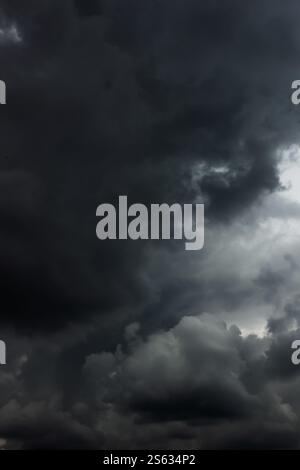 Dramatic sky with dark stormy rainclouds, may be used as background Stock Photo