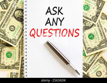 Ask any questions symbol. Concept words Ask any questions on beautiful white note. Beautiful background from dollar bills. Black pen. Business ask any Stock Photo