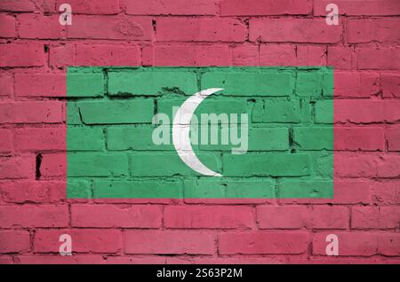 Maldives flag is painted onto an old brick wall Stock Photo - Alamy