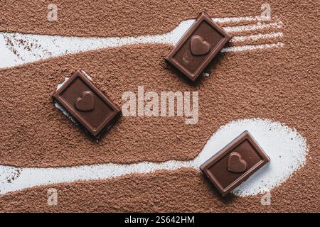 Chocolate bars and cocoa powder on white background. Top view Stock Photo