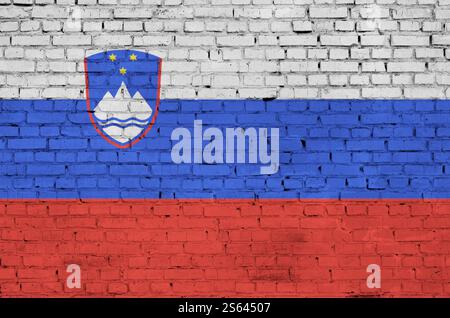 Slovenia flag is painted onto an old brick wall Stock Photo - Alamy
