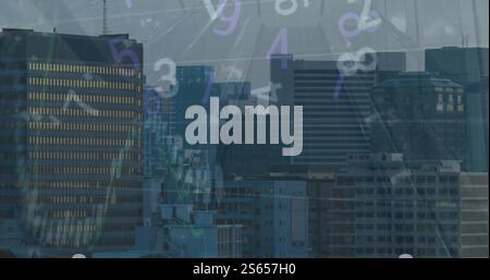 Image of numbers changing and diagrams over cityscape Stock Photo