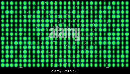 Image of rotating round green lights on black background Stock Photo