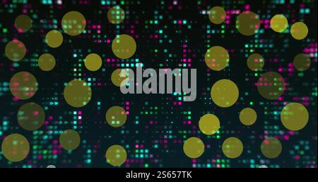 Image of yellow light spots over twinkling coloured data pixels on dark background Stock Photo