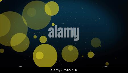 Image of yellow light spots over white particles on dark blue background Stock Photo
