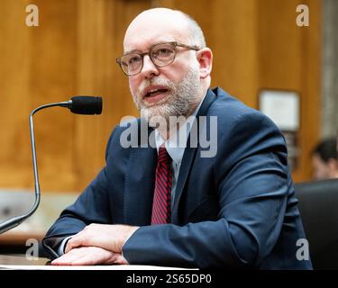 Office of Management and Budget Director Russell Vought walks to the ...