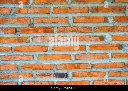 arrangement of red brick walls laid out using cement Stock Photo