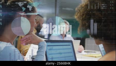 Image of data processing and diagrams over diverse colleagues discussing work with laptop Stock Photo