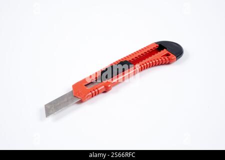 red utility knife on white background Stock Photo
