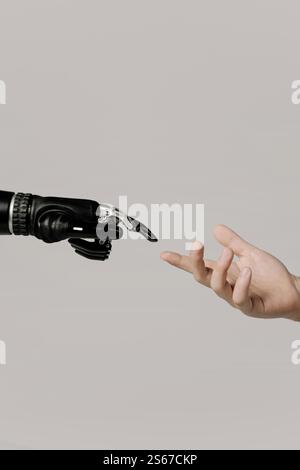 man and bionic arm a robot hand touching a mans hand Stock Photo