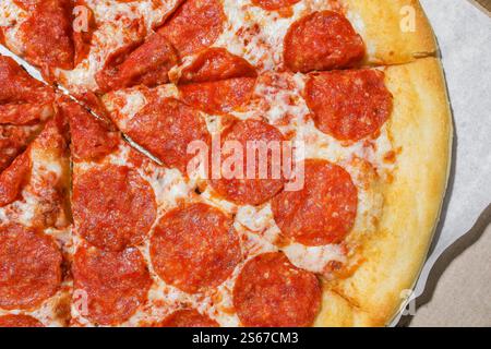 Pepperoni Pizza on a Box Stock Photo