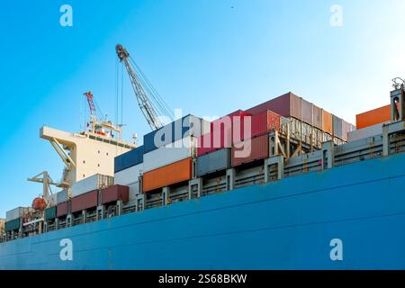 Close up to containers in a cargo ship at a port in Chile Stock Photo