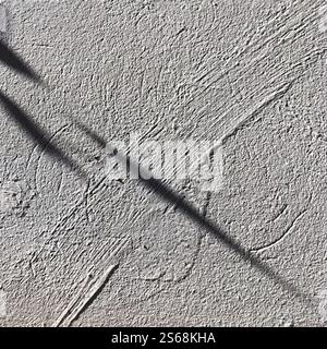 Abstract Textured Surface with Diagonal Shadows and Rough Lines in Natural Lighting Stock Photo