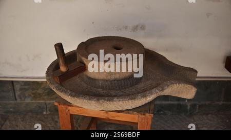 Close-up of a traditional Chinese country stone mill. High quality photo Stock Photo