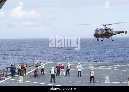 PACIFIC OCEAN (May 10, 2022) Sailors move a MK 46 torpedo for loading ...