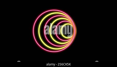 Image of glowing neon circles of light moving on black background Stock Photo
