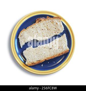 An image of a slice of bread broken in two pieces Stock Photo