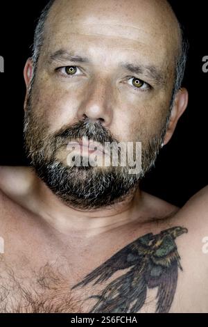 An image of a handsome man with a beard Stock Photo